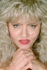 Lee Caroll as  in What Would Your Mother Say? 1982