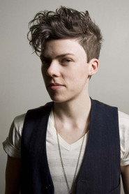 Ponyboy as Podcaster 2 in half-light 2023
