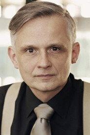 Błażej Wójcik as Bank Clerk in The Big Animal 2000