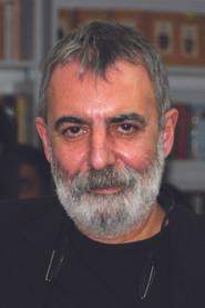 Orhan Alkaya as Enis in Yellow Smile 1992