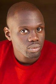 Mohamed Dione as Groomsman in Mother of George 2013