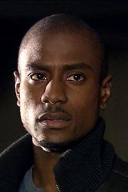 Michael Obiora as Brian Darnell in Joyeux Noel 2023