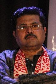 Subhasis Banerjee as Urmila's father in Sohorer Upokatha 2021