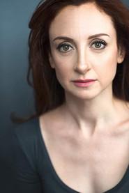 Lindsay Brill as Professional Woman in The Goodie Bag 2026