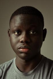 Clément Sambou as Adama in Father & Soldier 2023