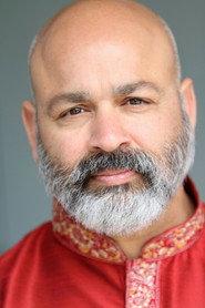 Rakesh Gosain as Gas Station Cashier in The Radio King 2019