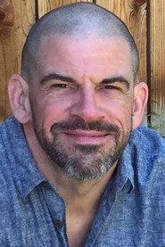 Brian Hillard as CDC Agent J. Reader in The Spore 2021