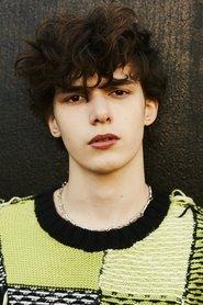 Flynn Allen as Alfie in Skeghead 