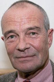 David Griffin as Malcolm Travers in Trog 1970