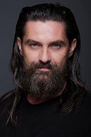 Nurettin Sönmez as Enrico in Dance with the Jackals 6 2022