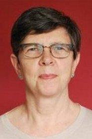 Lesley Manning as Reader in the Waiting Room in Good Thanks, You? 2020