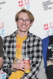 Carter Hess as Self (voice) in Tangled Roots 2022