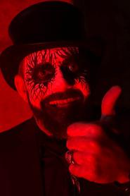 Kurt Forman as Doctor Chainsaw Gutsfuck in Pumpkin Guts: Devil's Night 2024