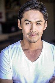 Toshiji Takeshima as Soshi Mifune in Sniper: G.R.I.T. - Global Response & Intelligence Team 2023