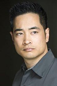 Ash Lee as Dr. Wiseley in The Journey Ahead 2022
