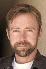 Charlie Vaughn as Bernie Andrews in The Corporate Cutthroat Massacre 2011