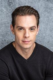 Billy Grimm as Police Dispatcher in The Hunting 2022