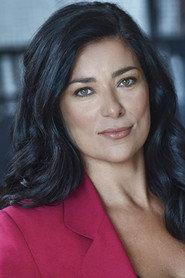Idalina Leandro as Emily (Anchorwoman) in All is Fine in '89 2024