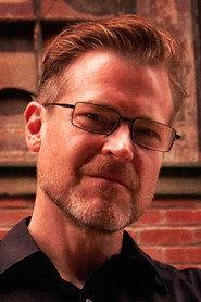 Eric Stanze as The Apparition, The Prisoner (segments "Survive", "Curveball: Pile Of Junk") in The Severed Head Network 2007