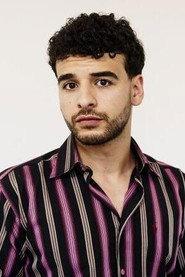 Ismail L'Hamiti as Milan in Mama Romy 2025