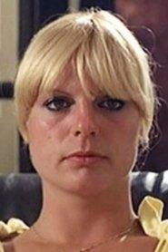 Élisabeth Buré as Clodowski's wife in Dur, dur 1981