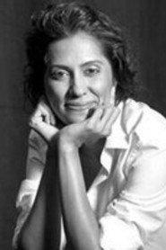 Malaika Shenoy as Nandita Malik in Peepli Live 2010