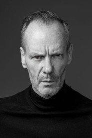 Donagh Gordon as Finn Pederson (archive footage) in thepedersonproject.net 2024