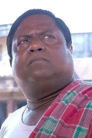 Gopal Baishnab as Tea Shopper in Sei Kalodin 2022