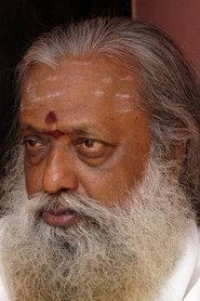 Balakumaran as Psychiatrist (Cameo Appearance) in Vallavan 2006