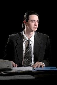 Federico Rojo as Hombre Sistema (System Man) in Azar Programado 2024