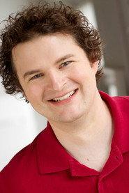 Darcey Johnson as Father John Dorr in Lockbox 2026