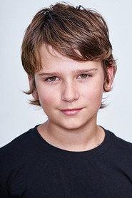 Ezra Barry as Young Corey in Boys in the Trees 2016