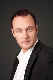 Henrik Normann as Norm / Maie / Väino in Made in Estonia 2003