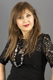 Nina Kumar as in The Desi Sherlock