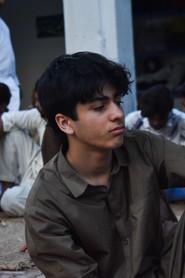 Kamran Ahmed Khan as Young boy in A ROOFTOP 2025