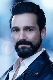 Doug Rao as Jez Kinnion in The Debt 2003
