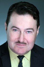 Allen Lewis Rickman as Baker in Underground Terror 1989