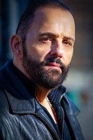 George Zouvelos as Lt. Adam Galanis in Once a Week for Life 