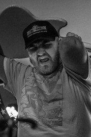 Brody Britton as Hands/Phone Voice/Driver in Overdue 2023