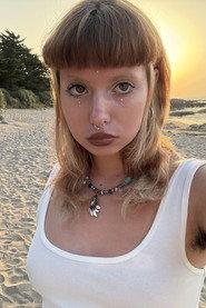 Julie Doidy as Ju in vlog4life 2026