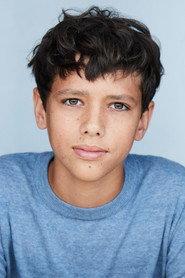 Lokota Kayn as Dylan in A Vintage Christmas 2024