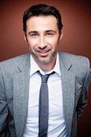 Clément Koch as Le réceptionniste in Special Correspondents 2009