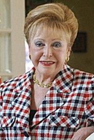 Rheta Hutton as Mrs. Badgett in He Sees You When You're Sleeping 2002
