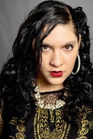 Deuandra T. Brown as Champagne in A Larceny Christmas 2019