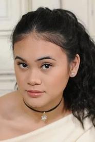 Martina Ortiz Luis as Kenzie Reid in Unwrapping Christmas: Lily's Destiny 2024