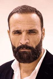 Babrak Akbari as Hussein in 1% - The Voice Within 