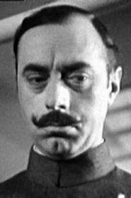 André Michaud as Un agent (uncredited) in Under the Roofs of Paris 1930