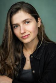 Alexandra Boulton as Receptionist in Nuisance 2025