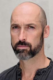 Adam Burton as Toby Morris in Other Side of the Game 2010