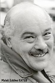 Malek Kateb as Cafe owner in Douce France 1995